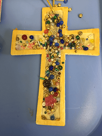 Shiny Yellow Crafted Cross
